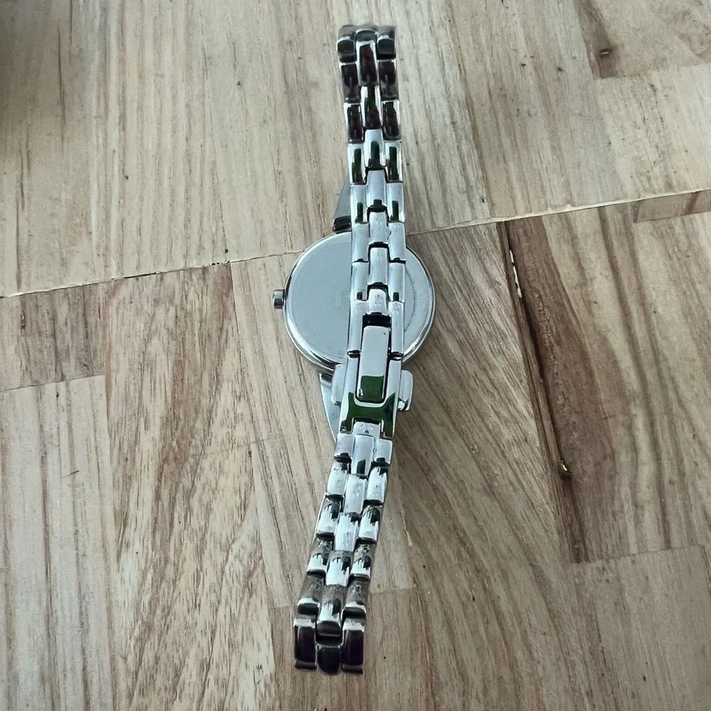 Citizen eco-drive ladies black dial silver tone solar powered dress watch